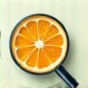 Icon representing a magnifying glass over a fruit.